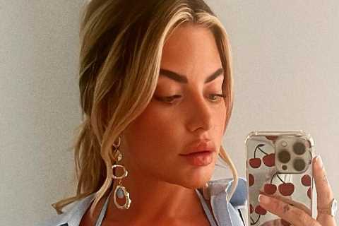 Love Island’s Megan Barton Hanson shows off toned abs in tiny orange bikini top