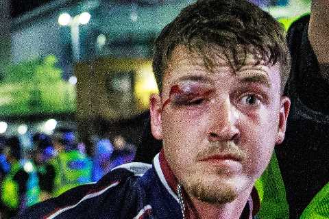 Manchester City fans smash up cop van and clash with riot police after side wins Champions League..