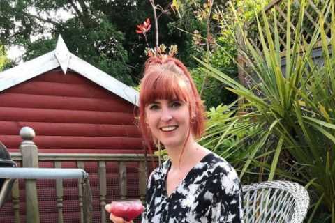 Antiques Road Trip’s Izzie Balmer flashes her legs in summer dress as she enjoys a cocktail in hot..