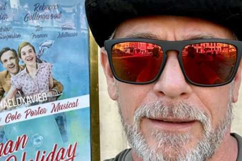 EastEnders star Adam Woodyatt is unrecognisable from Walford days as he poses outside theatre