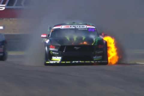 Watch terrifying moment car bursts into FLAMES during race and driver dashes away from blazing scene