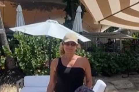 Gladiators Zodiac star Kate Staples, 58, looks incredible in black swimsuit 27 years after hit show