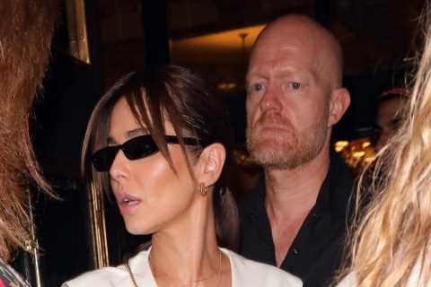 Cheryl mobbed by fans as she leaves the theatre in London with EastEnders star Jake Wood