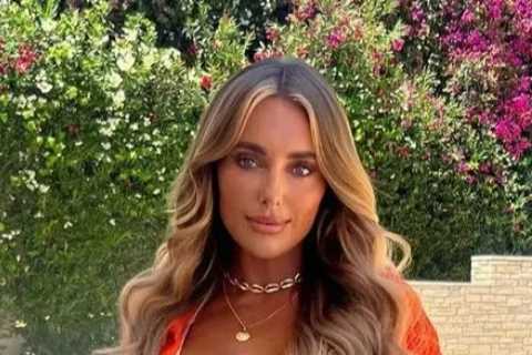 Towie’s Amber Turner reveals her rock hard abs in racy outfit after flying into Cyprus to confront..