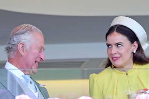 King Charles laughs with comedy star at Ascot as he cheers from the stands with Queen Camilla