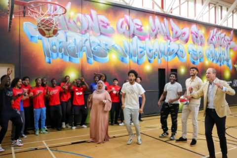 Prince William nets on Sheffield basketball court with Aston Villa’s Tyrone Mings