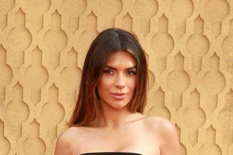 Love Island winner Ekin Su ditches her underwear in cut out thigh-split dress on Indiana Jones red..