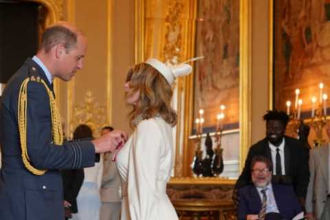 Kate Garraway is watched by proud husband Derek Draper as she gets MBE from Prince William