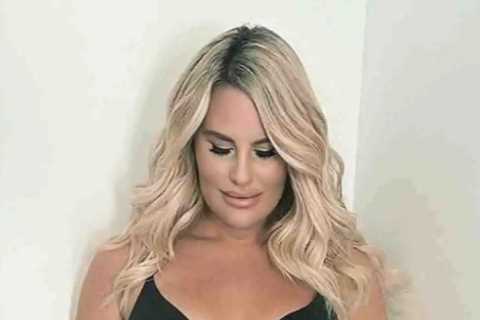 Towie’s Danielle Armstrong shows off her huge baby bump as she poses in a bra