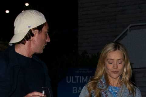 Laura Whitmore holds hands with close pal as she leaves BST Hyde Park after watching Take That