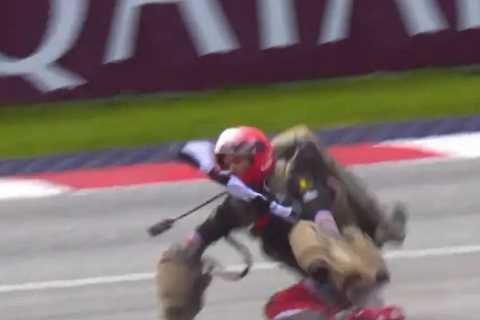 Bizarre moment man hovering over Austrian GP in jet pack CRASHES on track leaving F1 star and..