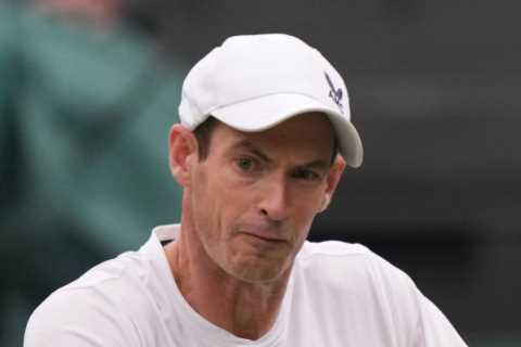 Andy Murray breezes past fellow Brit Ryan Peniston in straight sets at Wimbledon to move into..