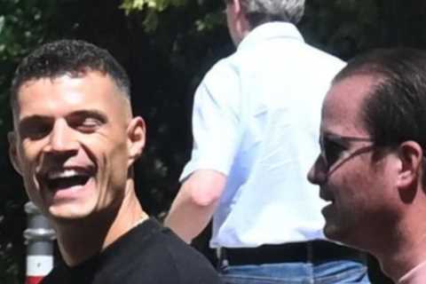 Arsenal fans can’t believe Granit Xhaka’s face as he’s spotted in Germany for Leverkusen medical..