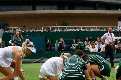 Brit tennis star Katie Boulter praised for clearing up mess after Wimbledon’s SECOND court invasion