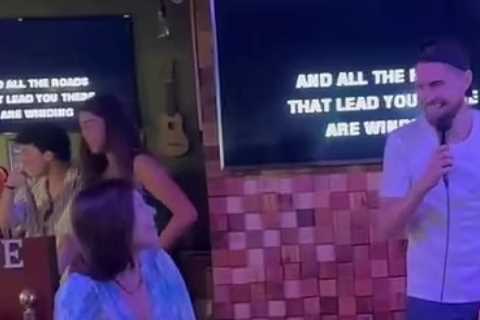 Watch Arsenal star Jorginho belt out Oasis track as he does karaoke with stunning Wag Catherine..