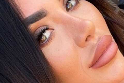 Towie’s Chloe Brockett leaves little to the imagination as she poses in plunging crop top and..