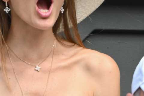 Djokovic’s stunning Wag steals the show on Centre Court in revealing top as he puts her through the ..