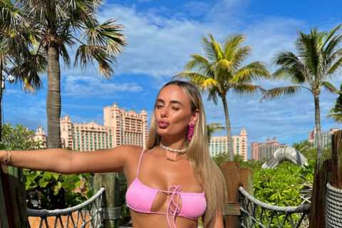 Millie Court looks incredible as she poses in pink bikini after going on holiday eight times this..