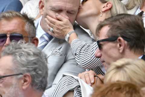 Zara and Mike Tindall share cheeky kiss as they put on a VERY cosy display at Wimbledon