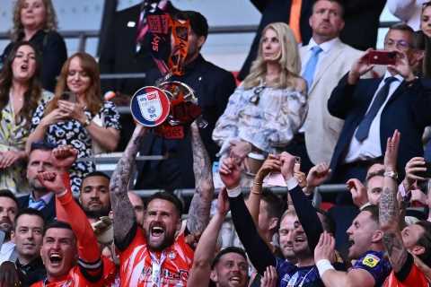Why have Luton Town postponed their first Premier League home game?