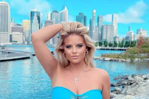Busty boxing ring girl Apollonia Llewellyn almost spills out of tiny bikini as she shows off major..
