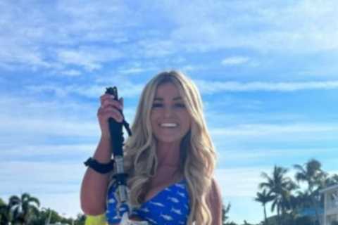 Glam golfer Emily Faulkner tries hand at new sport as she shows off huge catch and fans brand her..
