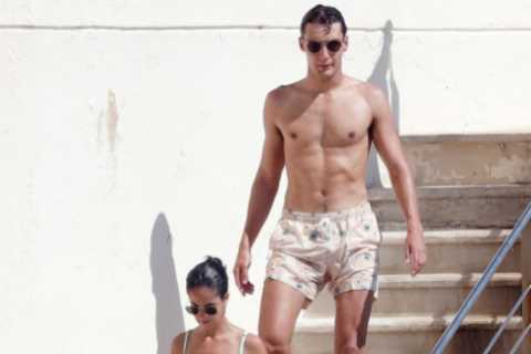 Ripped F1 star George Russell and stunning girlfriend Carmen Montero Mundt enjoy smooch in sea on..