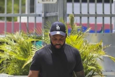 Saint West smiles at camera and looks like dad Kanye West as 7-year-old enjoys day out without mom..