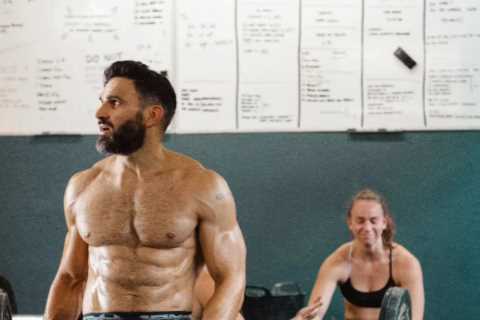 EastEnders star Davood Ghadami looks worlds away from Albert Square as he shows off ripped body and ..