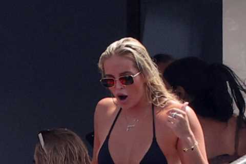 Love Island’s Mary Bedford flashes her bum in barely there thong bikini as she jumps off a yacht