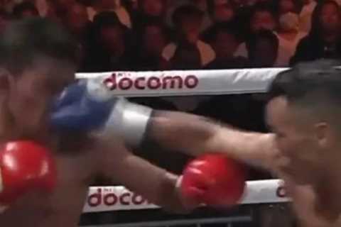 Boxing fans left wincing at delayed reaction after BRUTAL body shot as they say ‘that’s the sound..