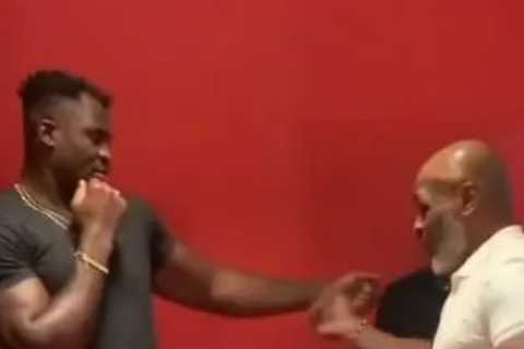 Watch Mike Tyson teach Francis Ngannou how to box as footage emerges after offer to train UFC star..