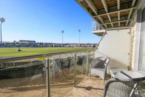 Two-bedroom flat overlooking Championship cricket ground goes up for sale – it’s so close you can..