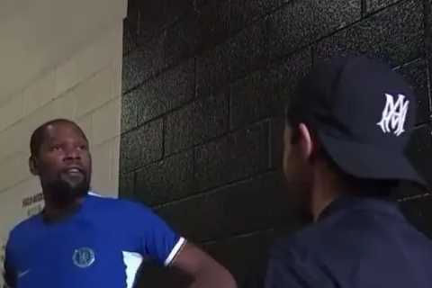 Watch Ben Chilwell hand 6ft 10in NBA star Kevin Durant a tiny Chelsea shirt as fans joke ‘he gave..