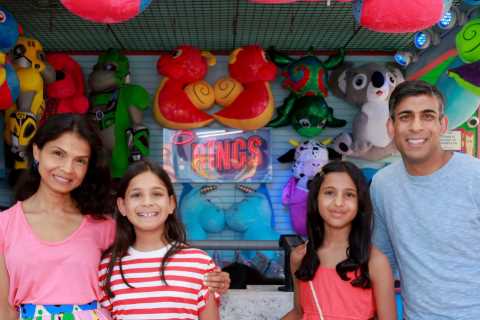 Rishi Sunak beams with wife and kids as they soak up the sun at Santa Monica Pier on California..
