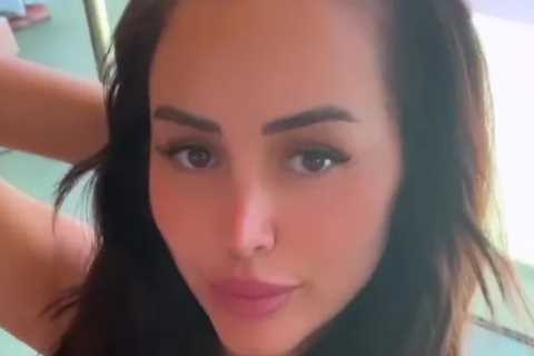 Marnie Simpson stuns in cut-out swimsuit as she cuddles up to husband Casey Johnson on family trip..