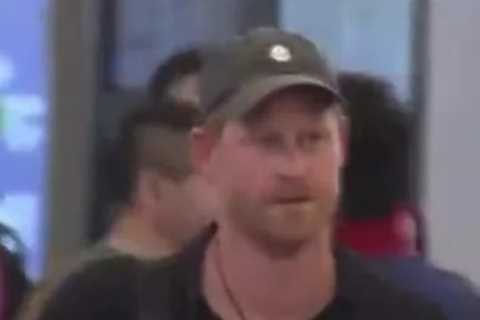 Prince Harry arrives in Japan without Meghan – and is seen proudly donning Archewell cap