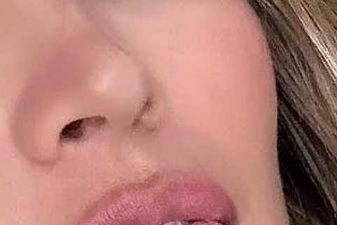 Ex-tennis star turned Playboy model delights fans as she sticks out her tongue and strips to bikini ..