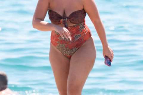 EastEnders legend Jacqueline Jossa relaxes with family as she hits the beach in swimsuit