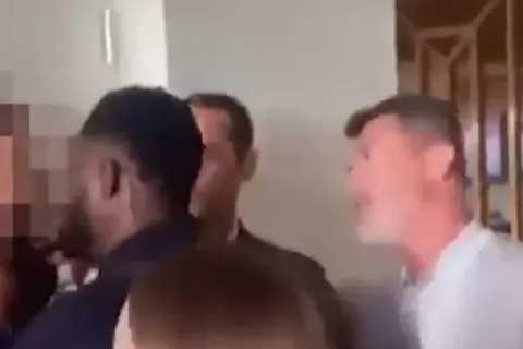Shocking moment Roy Keane & Micah Richards get in ‘heated argument with fan’ during Arsenal’s 3-1..