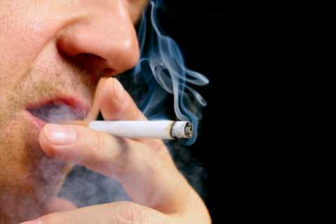 Smokers face BAN outside pubs and restaurants under major rule change demanded by officials