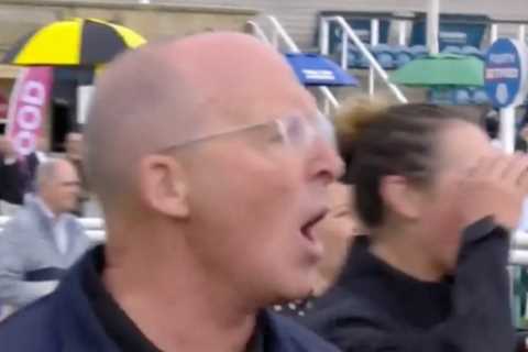 Watch ex-Prem ref Mike Dean go from ecstasy to agony as his horse finishes second but fans all..