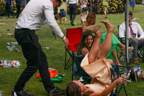 Wild scenes at the races as 85,000 punters go wild celebrating the Melbourne Cup