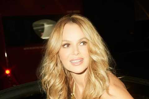 Amanda Holden stuns fans in daring gold dress, risking wardrobe malfunction