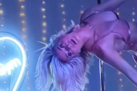 Hollyoaks Star Sarah Jayne Dunn Wows Fans with Pole Dancing Skills in Thong and Thigh High Boots
