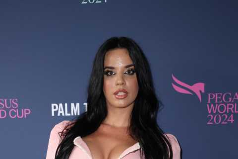 Ivana Knoll takes her stunning style to the horse racing world in a low-cut pink outfit