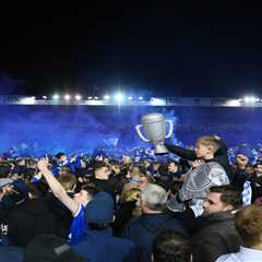 Portsmouth Fans Storm Pitch as Club Returns to Championship After 12 Years