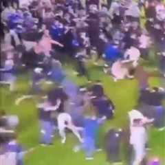 Shocking Moment Portsmouth Fans Allegedly Attack Barnsley Star During Pitch Invasion
