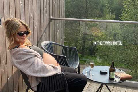 Pregnant Emily Atack proudly displays baby bump on luxury weekend getaway