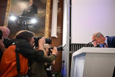 Nigel Farage clashes with protesters during Reform press conference